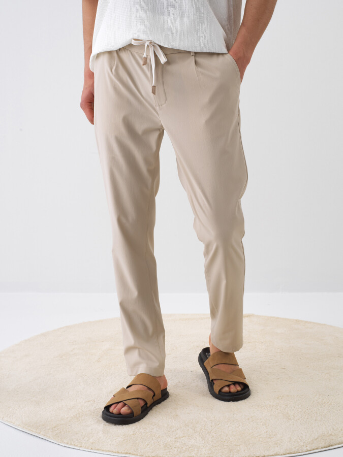 Bej Doğal Dökümlü Regular Fit Jogger